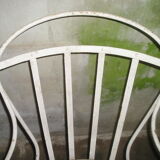 Wrought iron garden armchair with riveted flexible blades early XXth