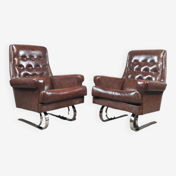 Pair of Lounge armchairs in brown imitation leather and vintage chrome steel 50"