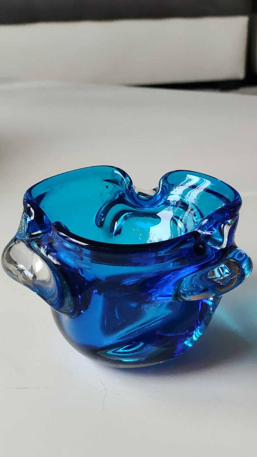 Empty pocket/Corolla shaped ashtray, in Murano style blown art glass, turquoise blue