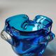 Empty pocket/Corolla shaped ashtray, in Murano style blown art glass, turquoise blue