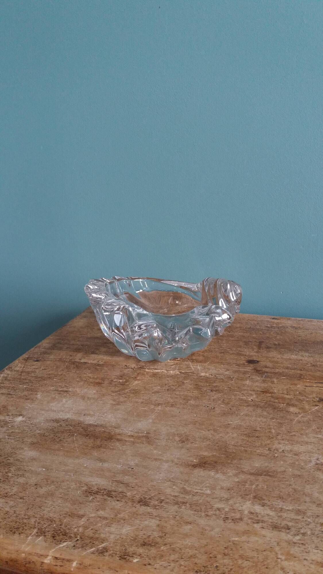 Shell-shaped crystal paperweight.