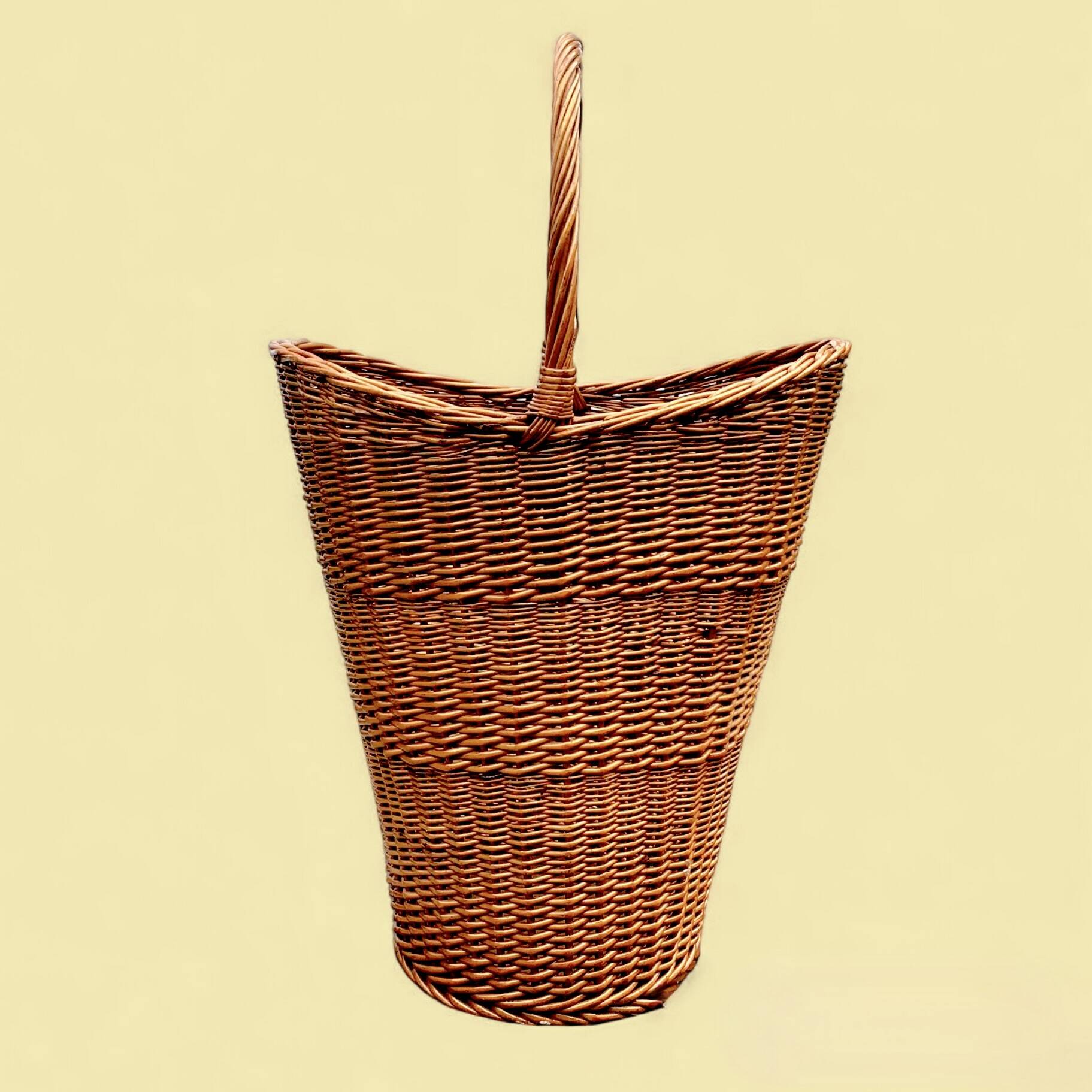 Old woven wicker umbrella stand