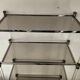 Vintage shelf in lucite, brass, and smoked glass from the 1970s.