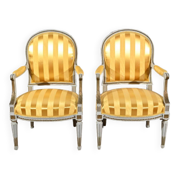 Pair of Cabriolet Armchairs, in rechampi wood, Louis XVI style – Late 19th century