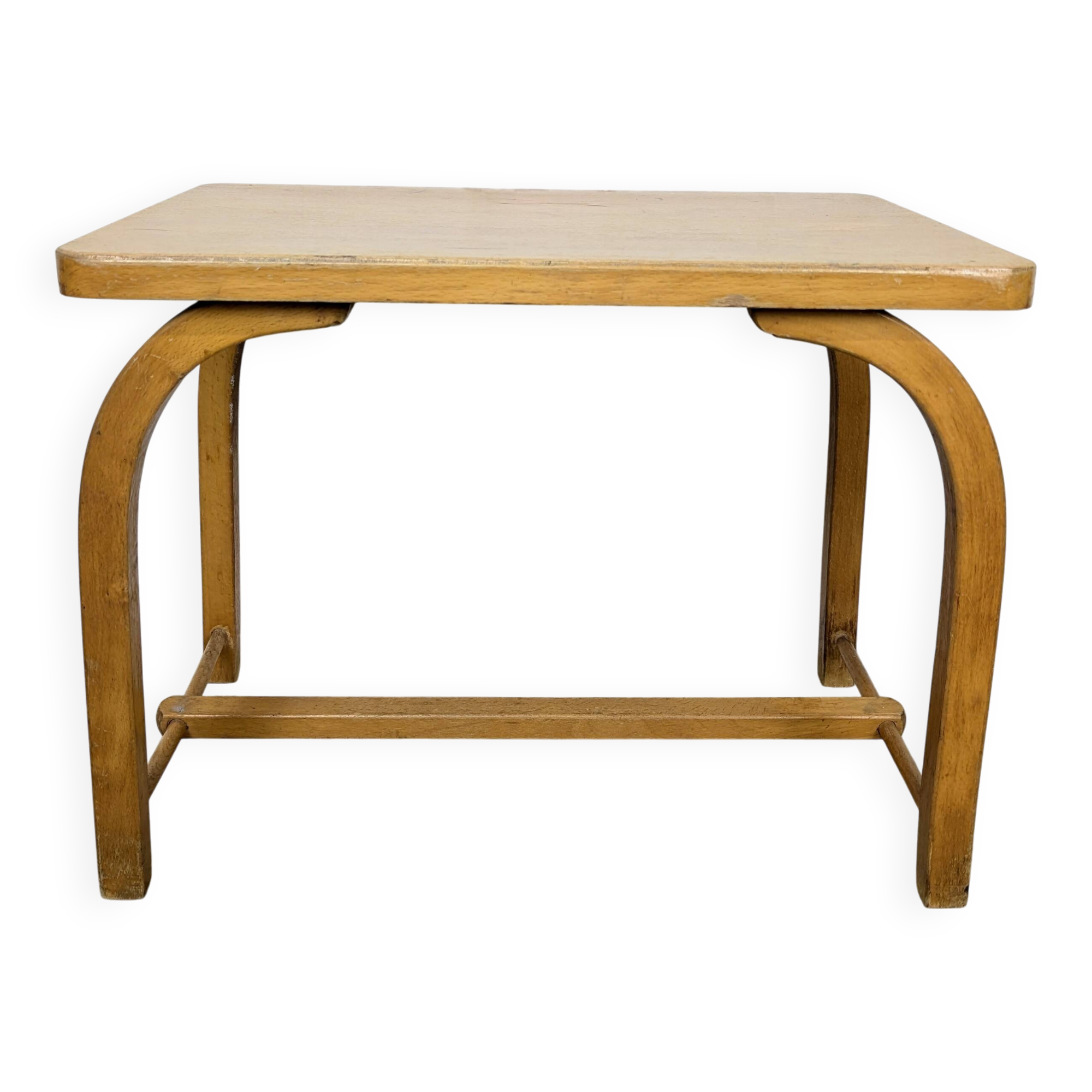 Old curved wooden children's desk.