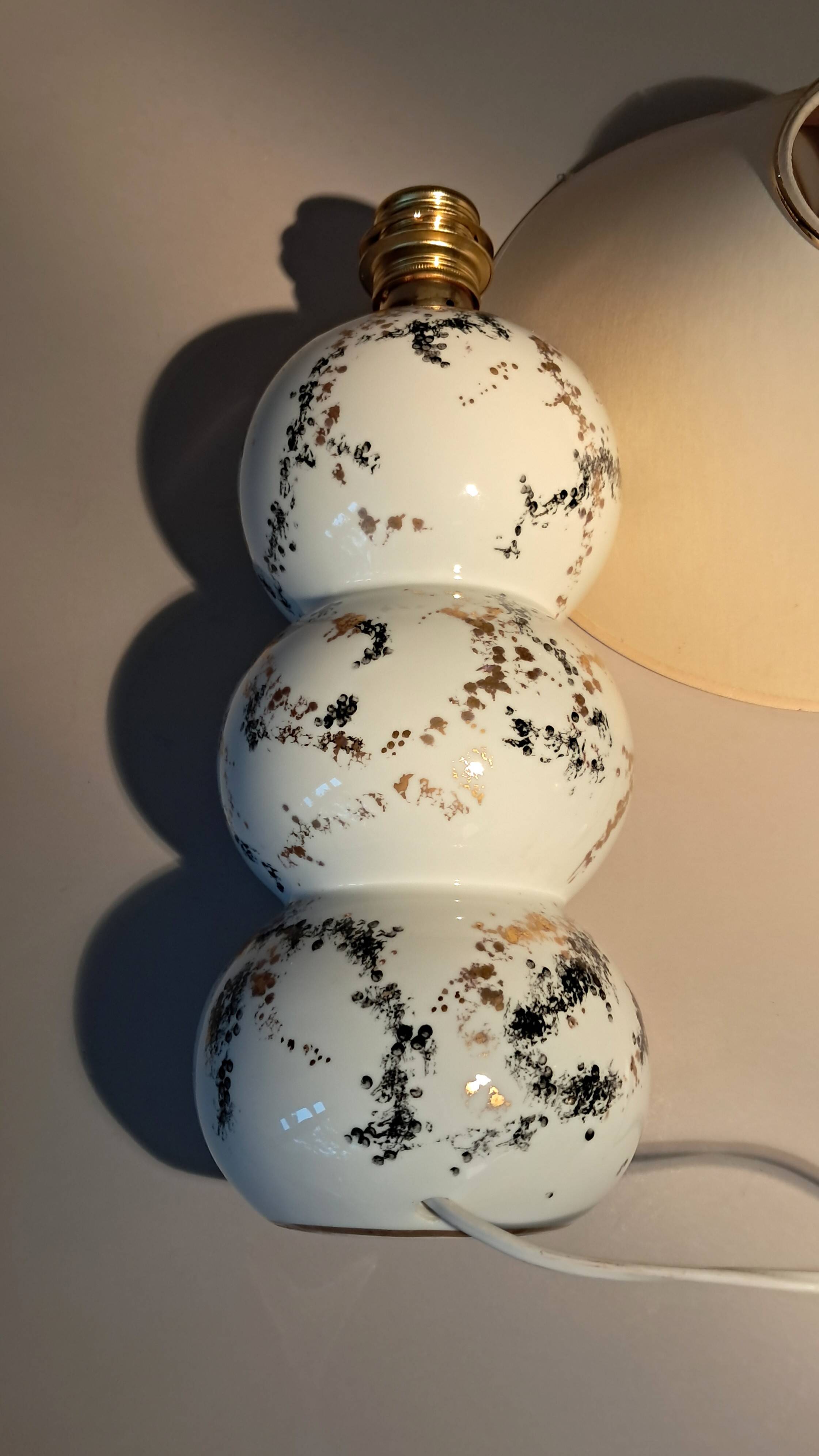 Fine porcelain lamp painted and gilded with fine gold. Laure Selignac, Paris.