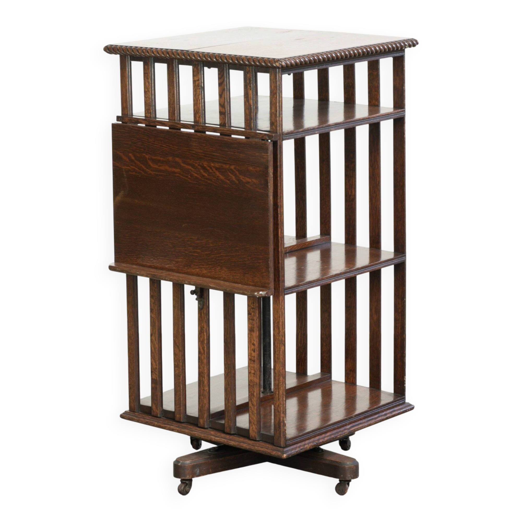 Large antique English oak book carousel from the 19th century