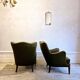 Modern Danish armchairs by Alfred Christensen. Beautiful shape, brass legs.