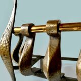 Old cast iron and brass log holder