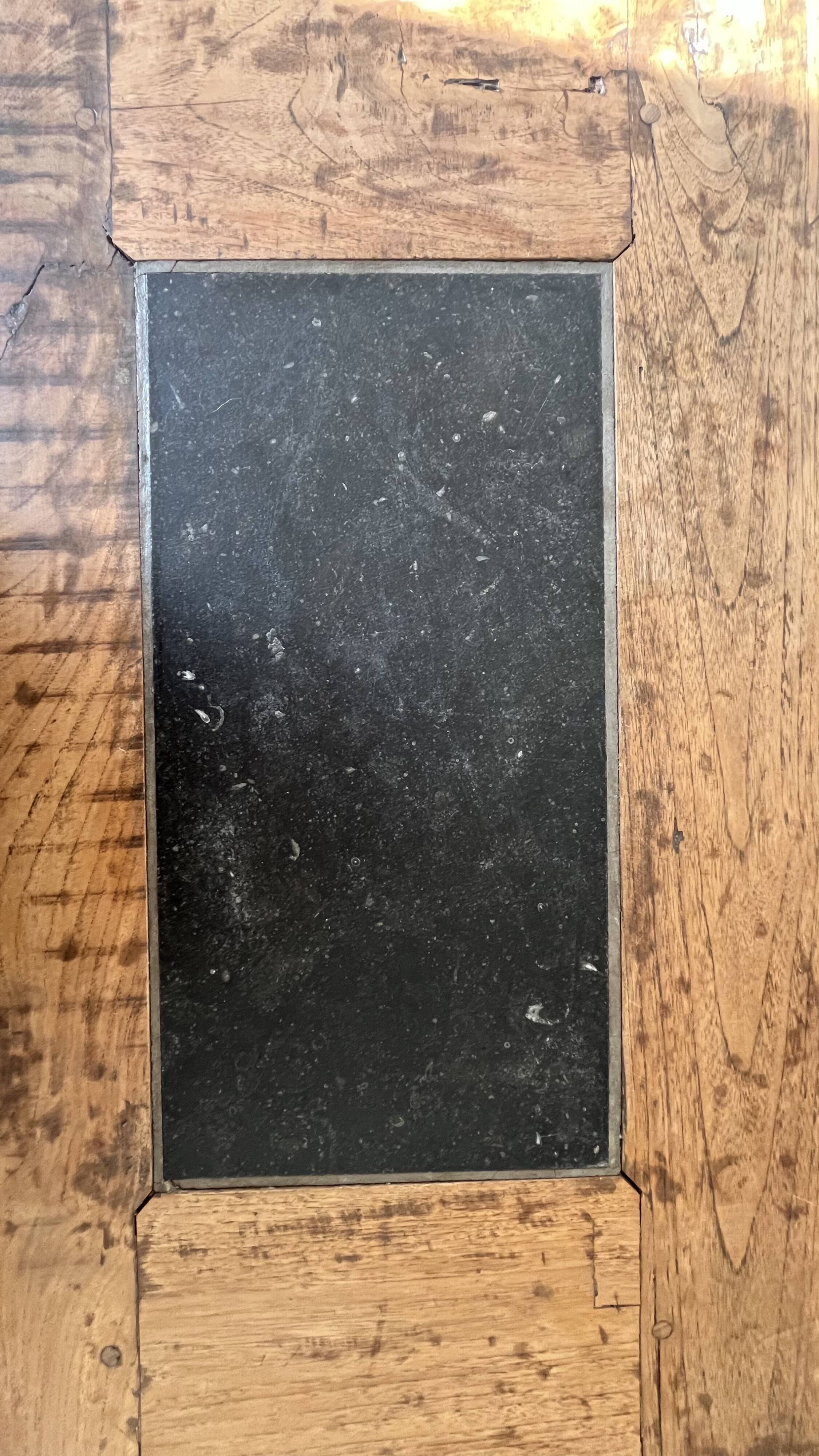 Teak table with blue stones