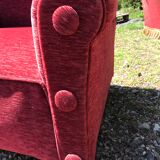 Impressive red velvet eared armchair