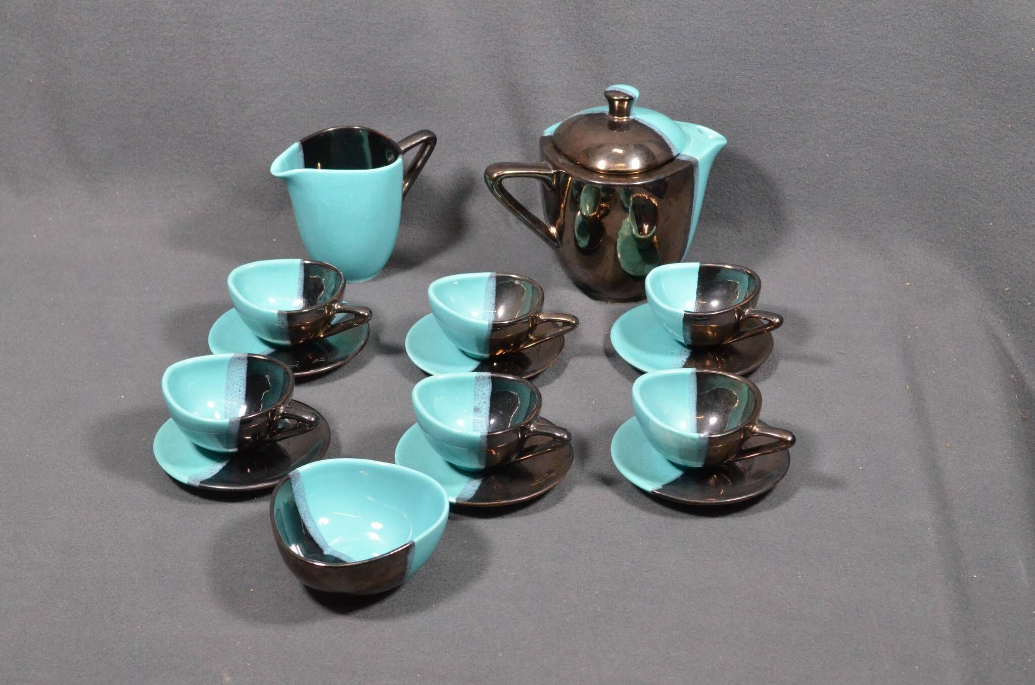Vallauris coffee service in black and turquoise earthenware.
