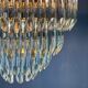 Lustre en verre taillé Murano à quatre niveaux par Venini, Italie, années 1970.