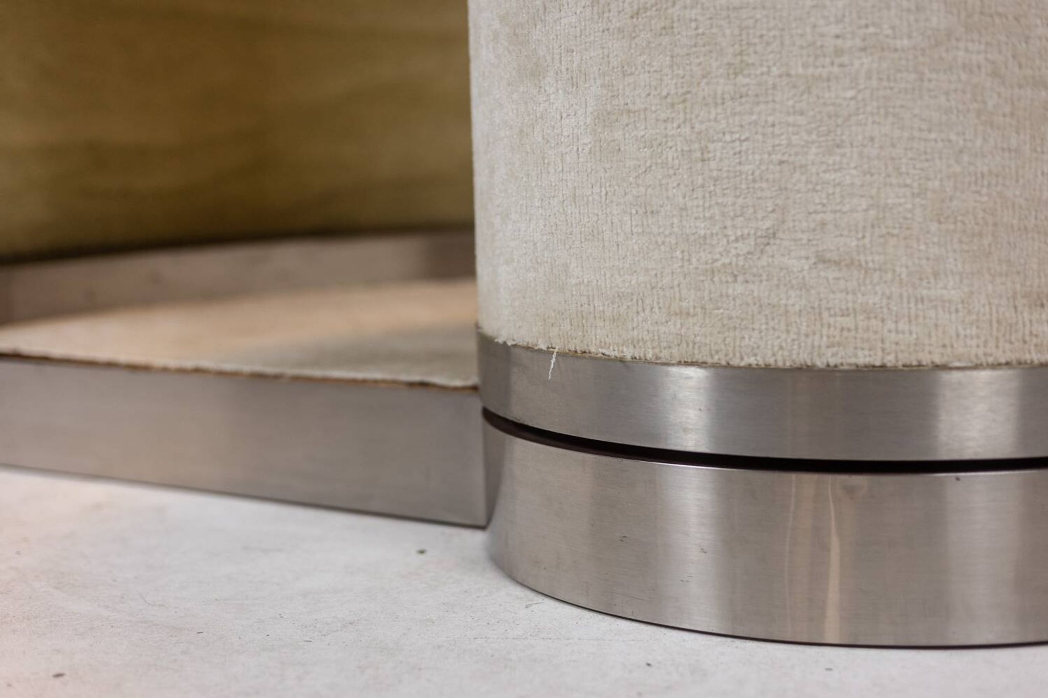 Circular bar in brushed metal, wood and carpet. 1970s.