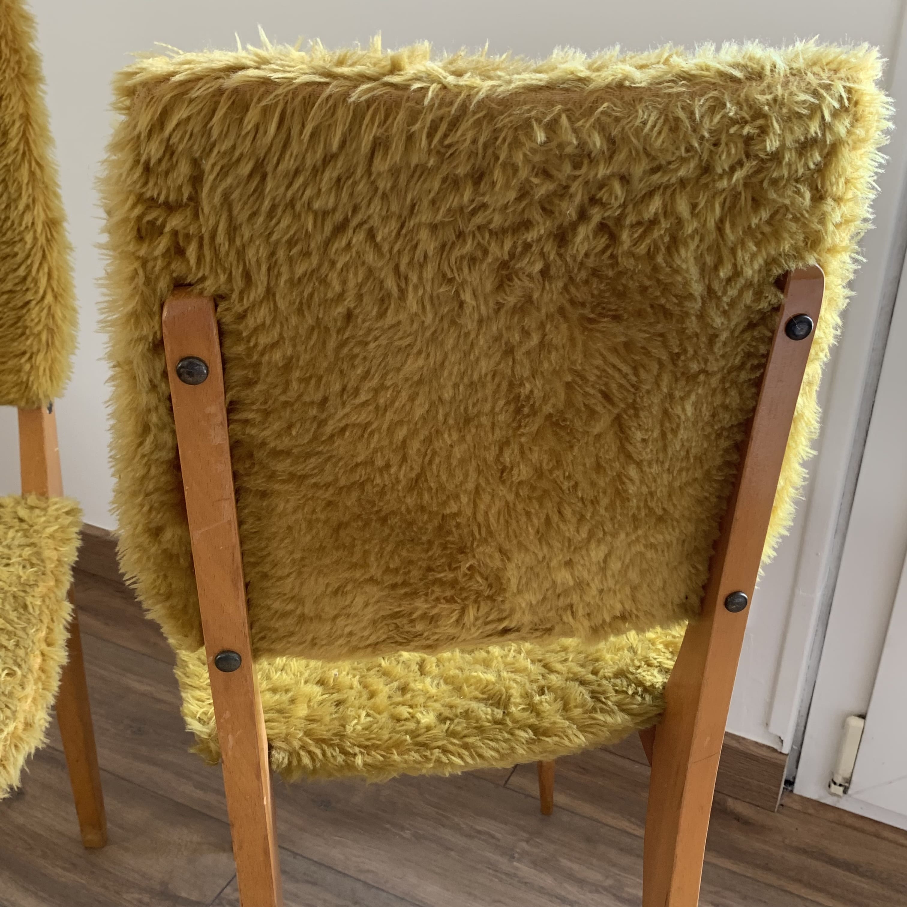 2 yellow moumoute chairs