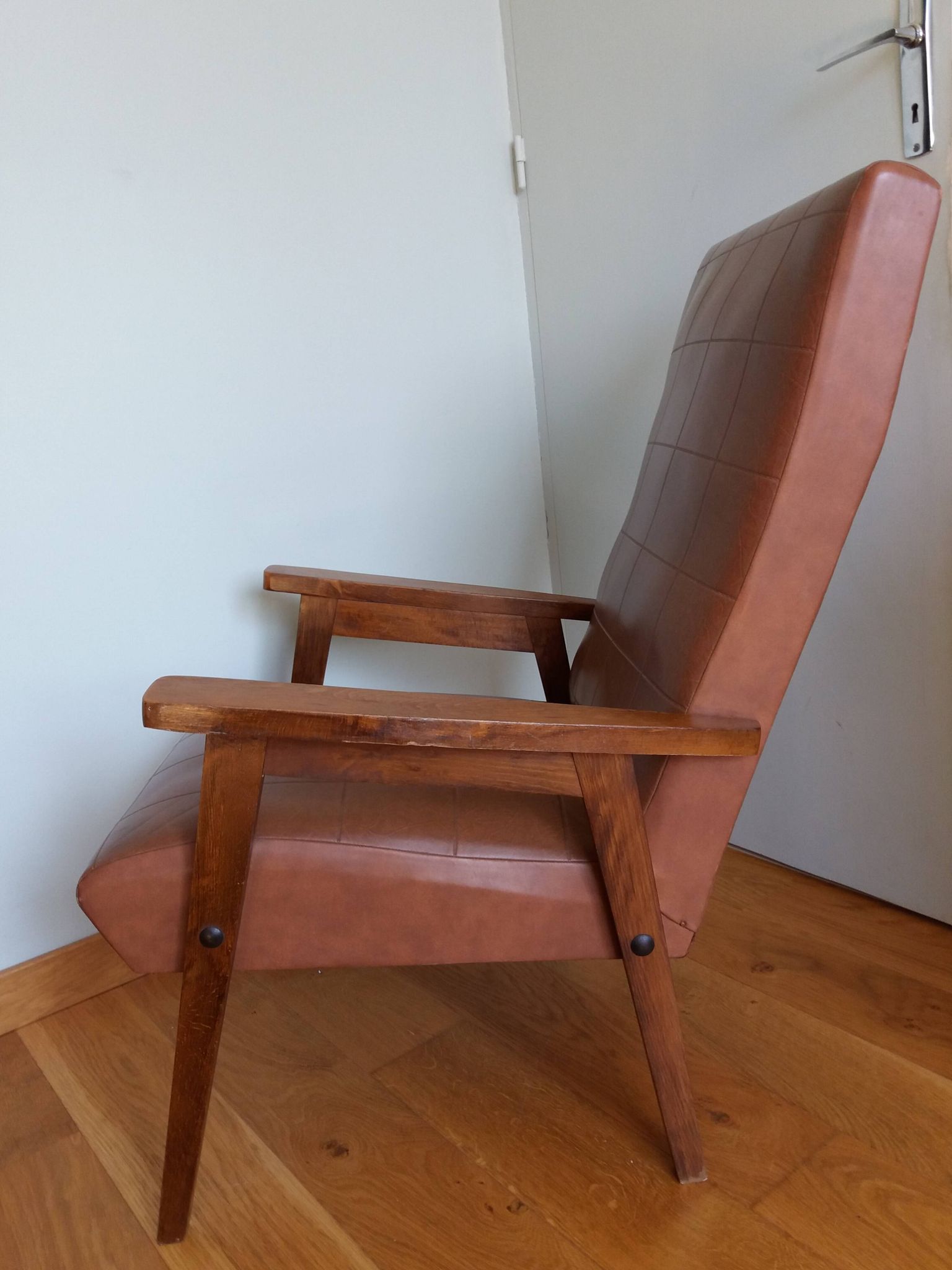 Scandinavian brown skai and wood armchair