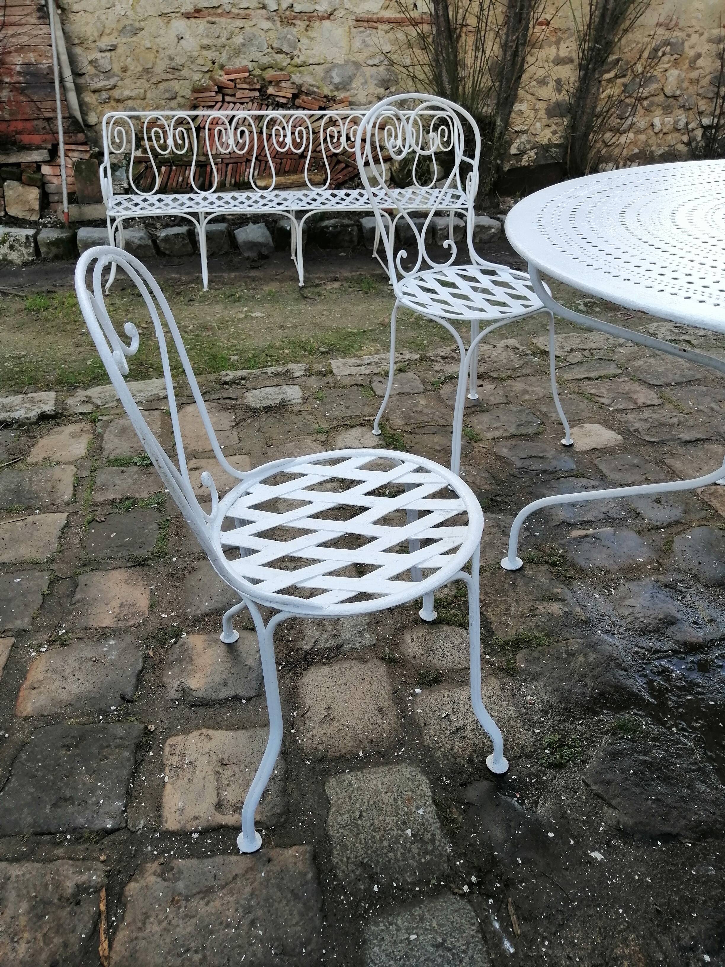 Antique wrought iron garden furniture