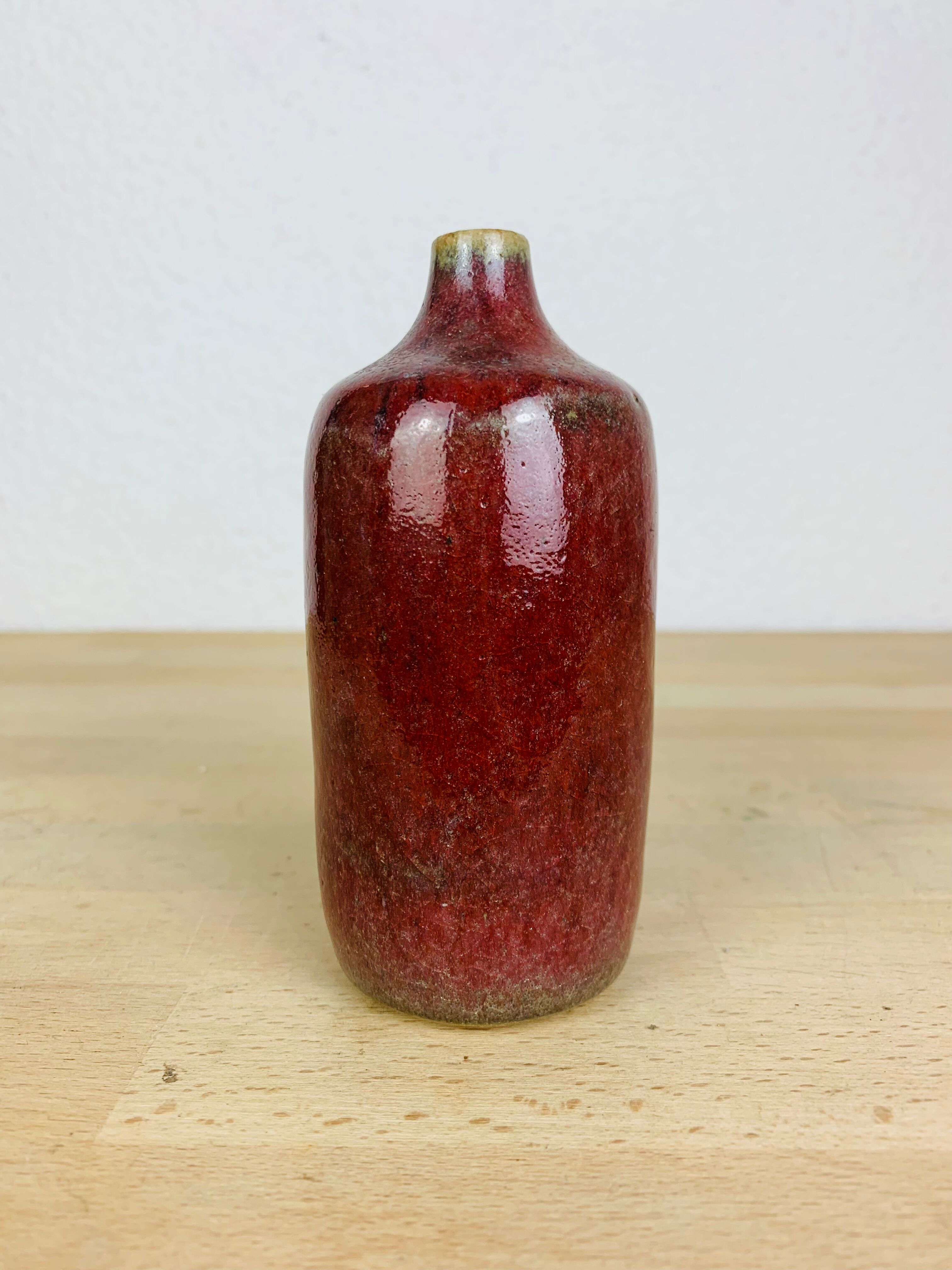 Vase red ceramic bottle signed