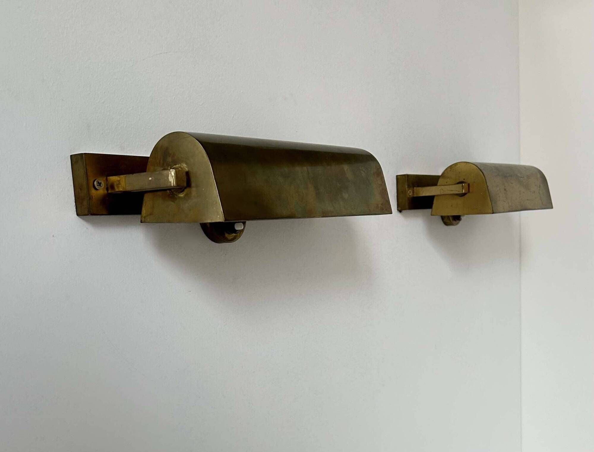 Pair of vintage modernist wall lights, adjustable in brass, France 1940