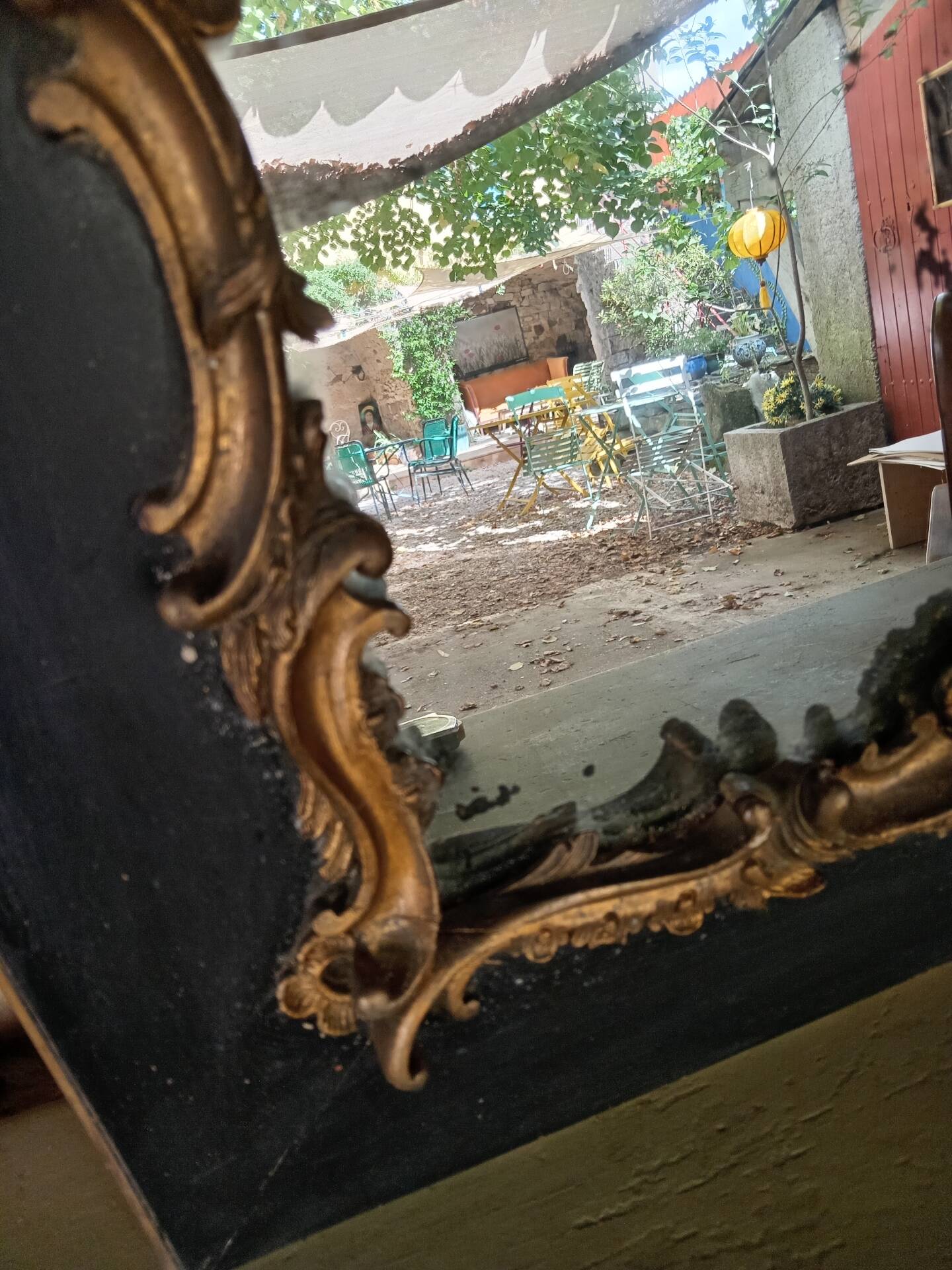 Antique mirror in stucco and wood