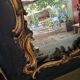 Antique mirror in stucco and wood