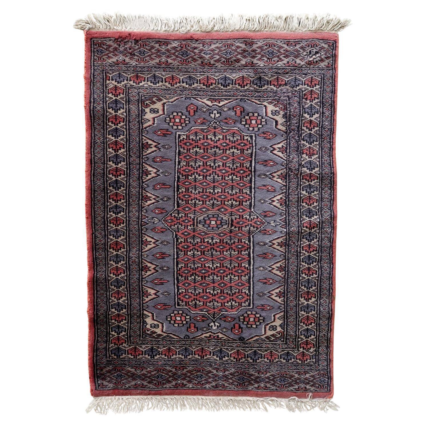 Handmade vintage Uzbek Bukhara rug 64cm x 94cm 1950s