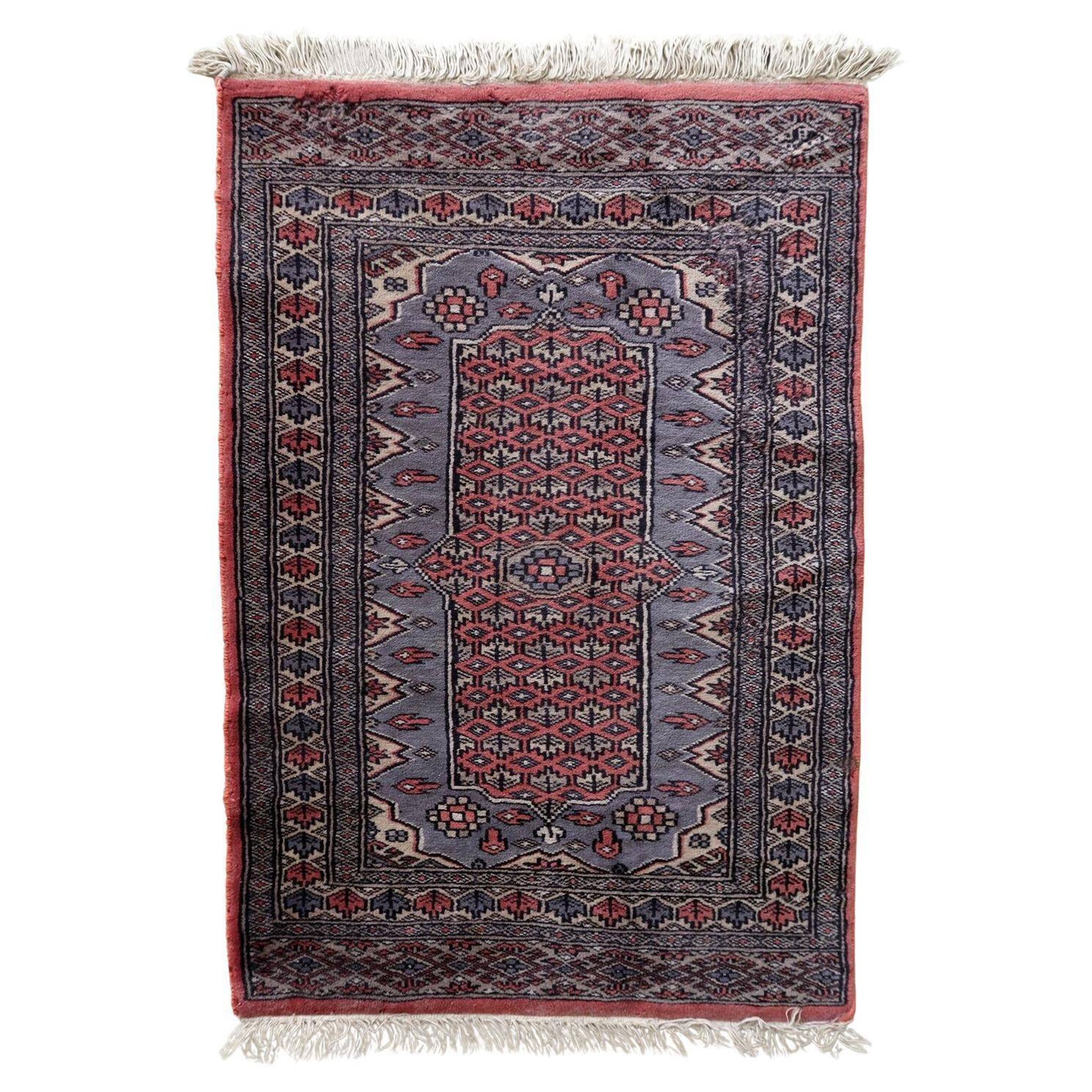 Handmade vintage Uzbek Bukhara rug 64cm x 94cm 1950s