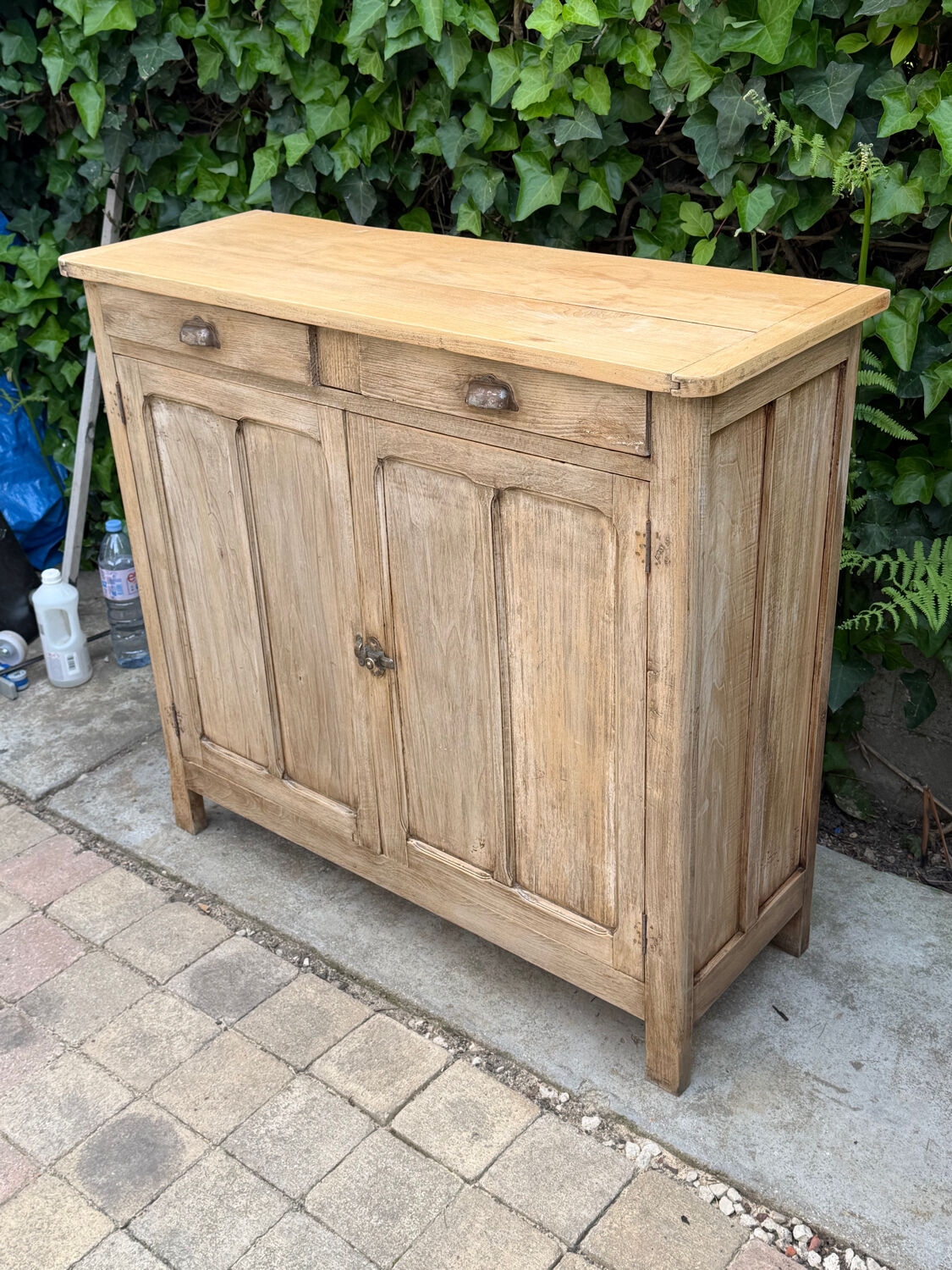 Antique patinated Parisian buffet with shell handles.