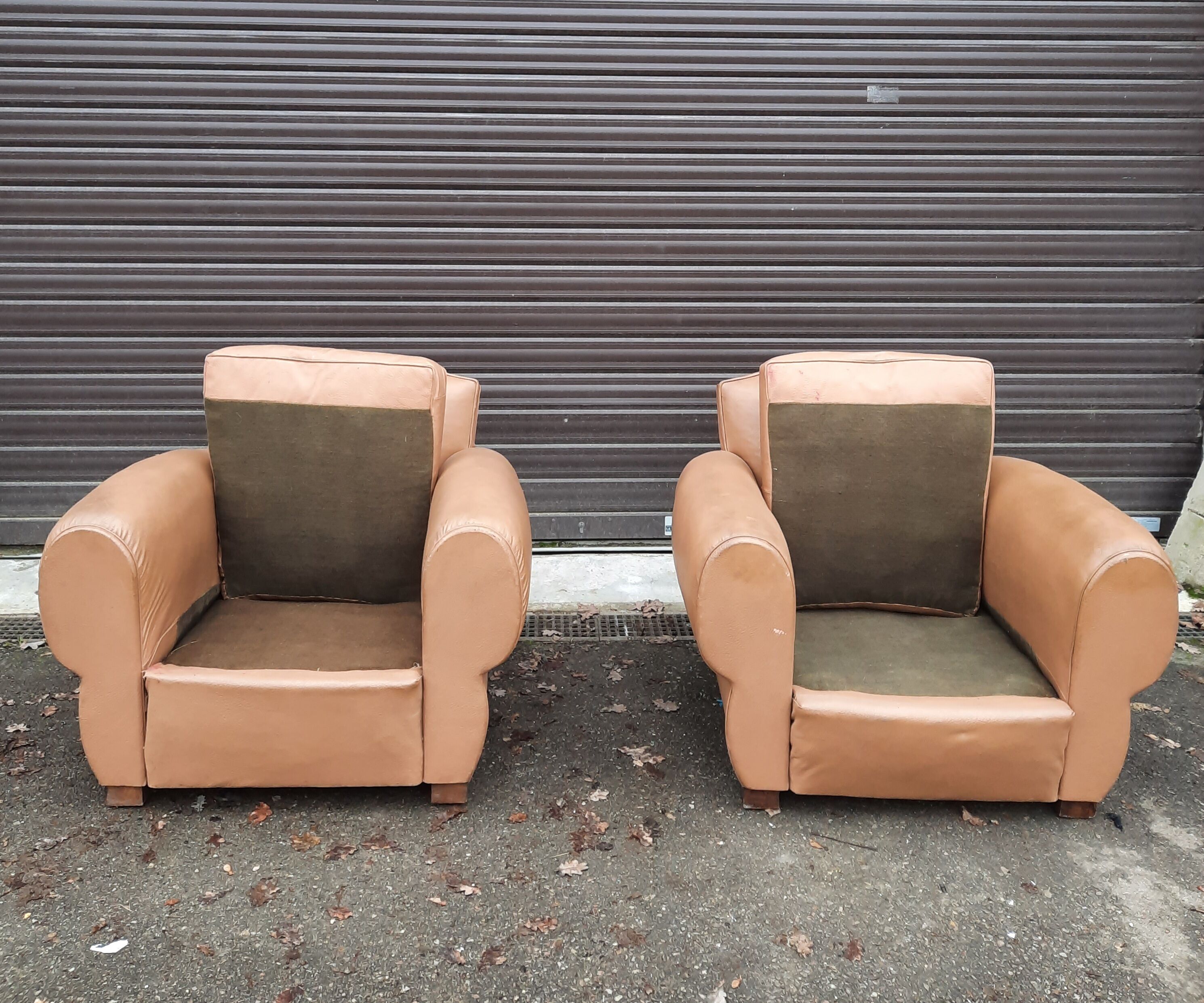Pair of club chairs in skai