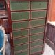 Empire-style mahogany cabinet – 12 drawers lined with green leather –