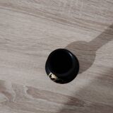 Black decorative vase with gold pattern