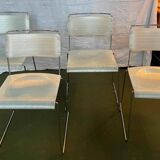 Set of 4 Italian Spilimbergo chairs in chromed steel and white plastic