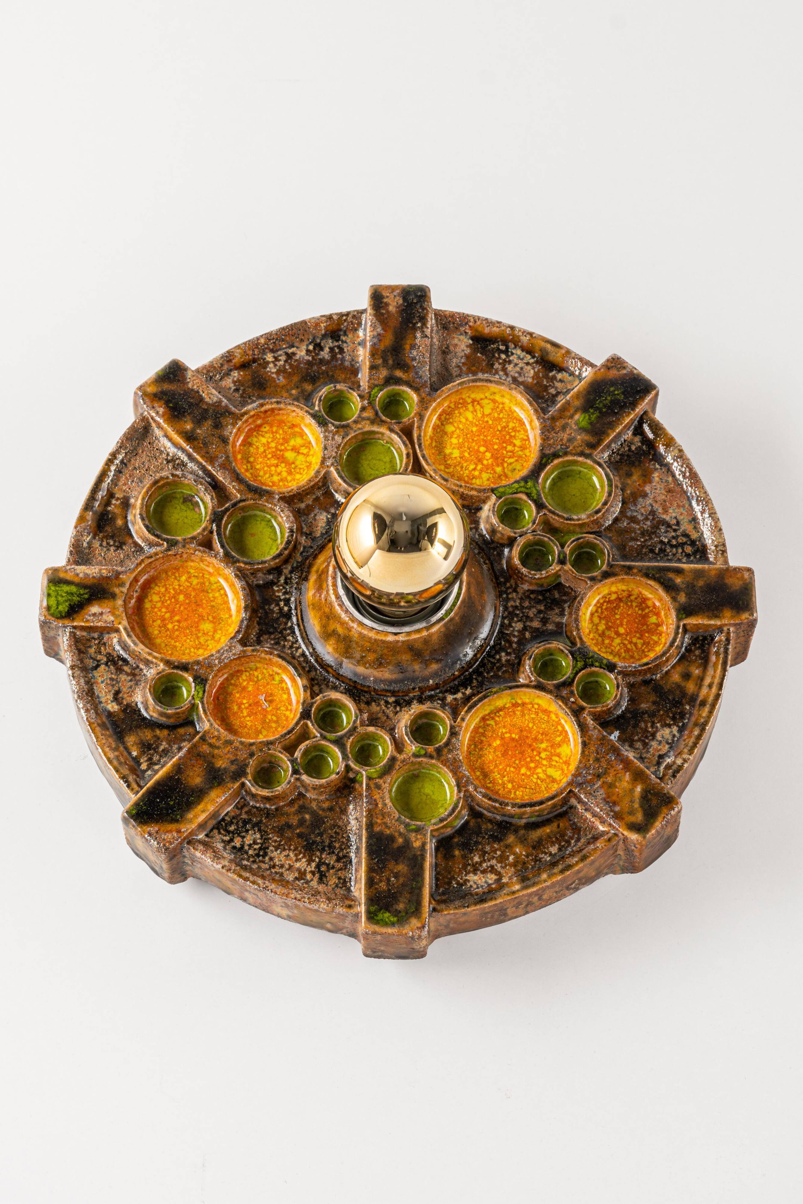 Sputnik wall lamp in brown and orange ceramic, Germany, 1970s.