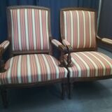 Pair of Louis XVI style walnut armchairs