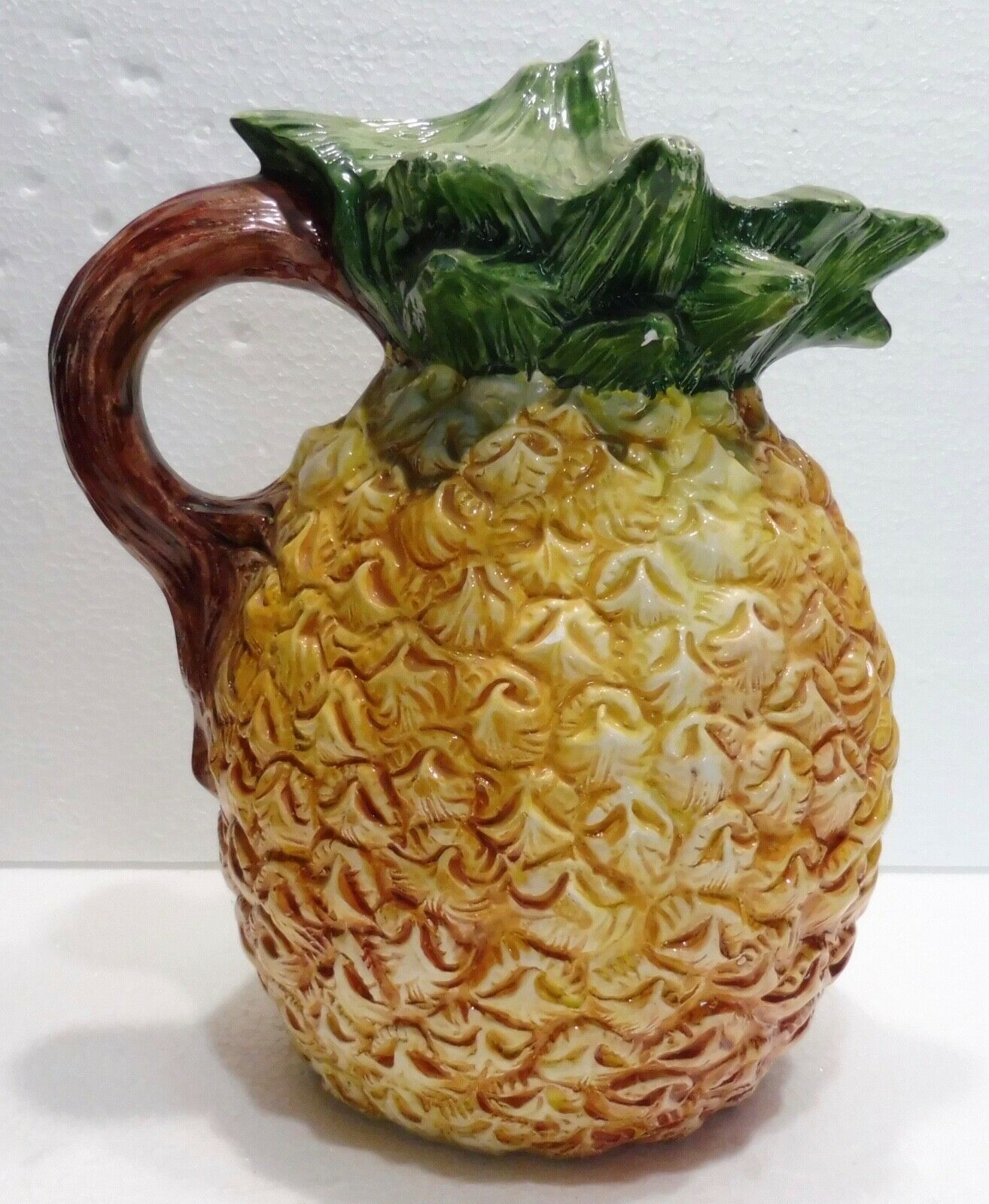 Pitcher on pineapple earthenware