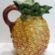 Pitcher on pineapple earthenware