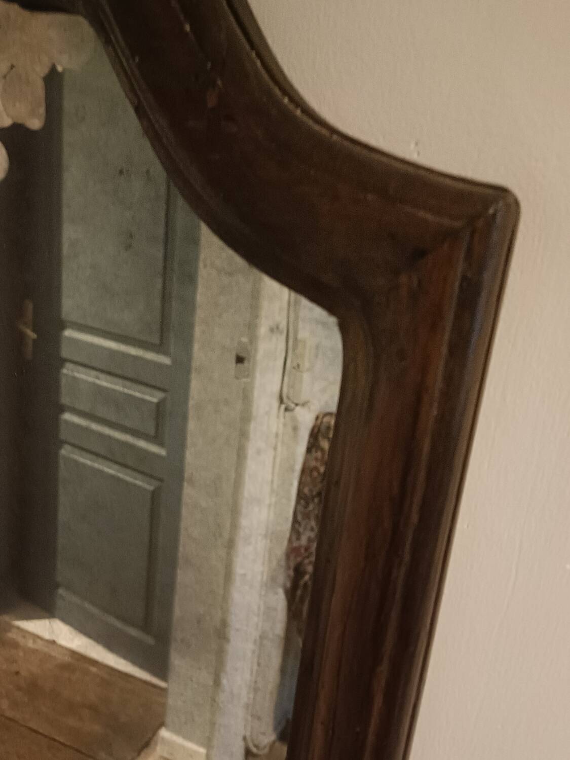 Antique shaped mirror, wood and bronze