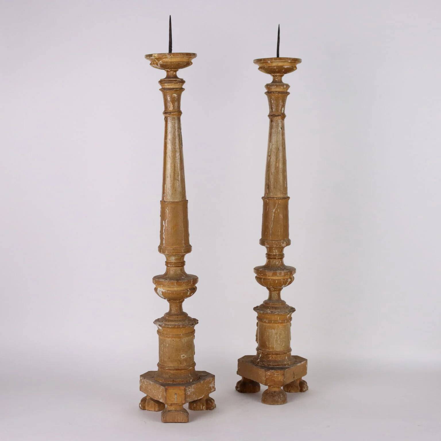 Pair of antique Empire candlesticks in wood, Europe, early 19th century.