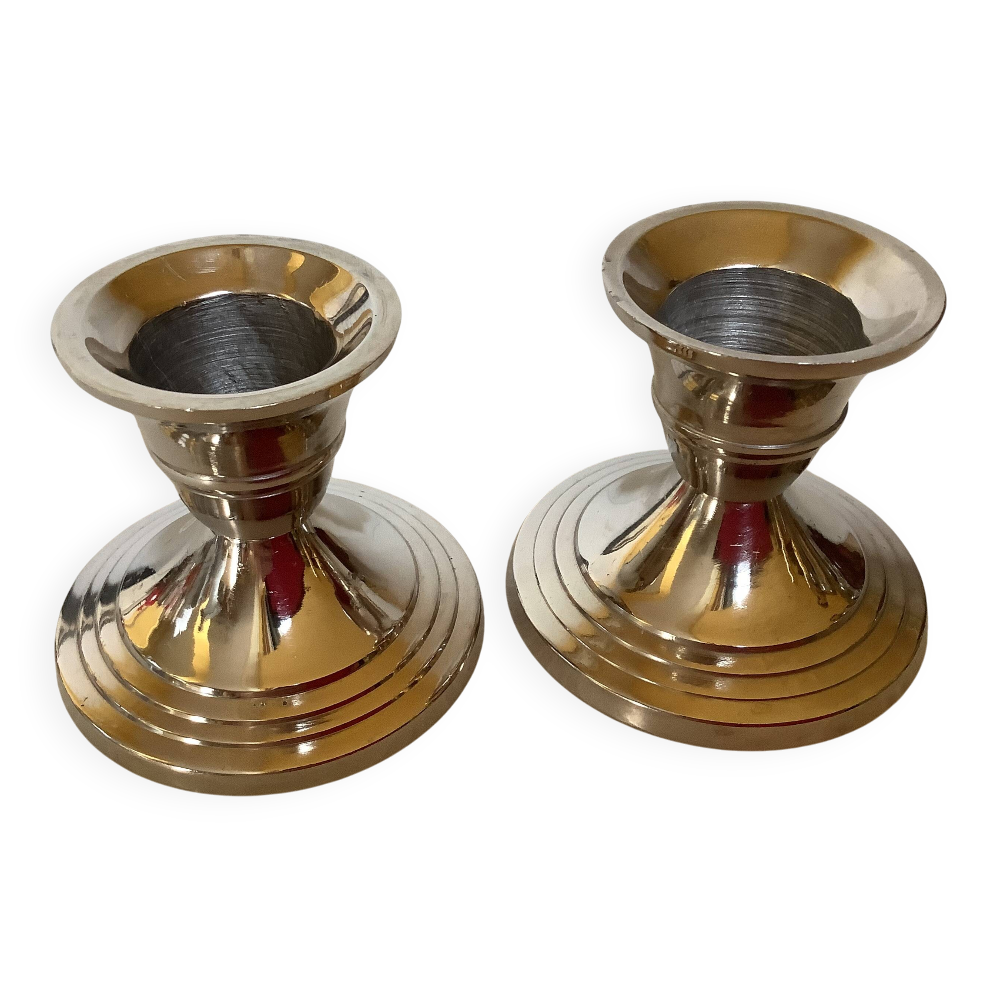 Pair of small silver metal candlesticks