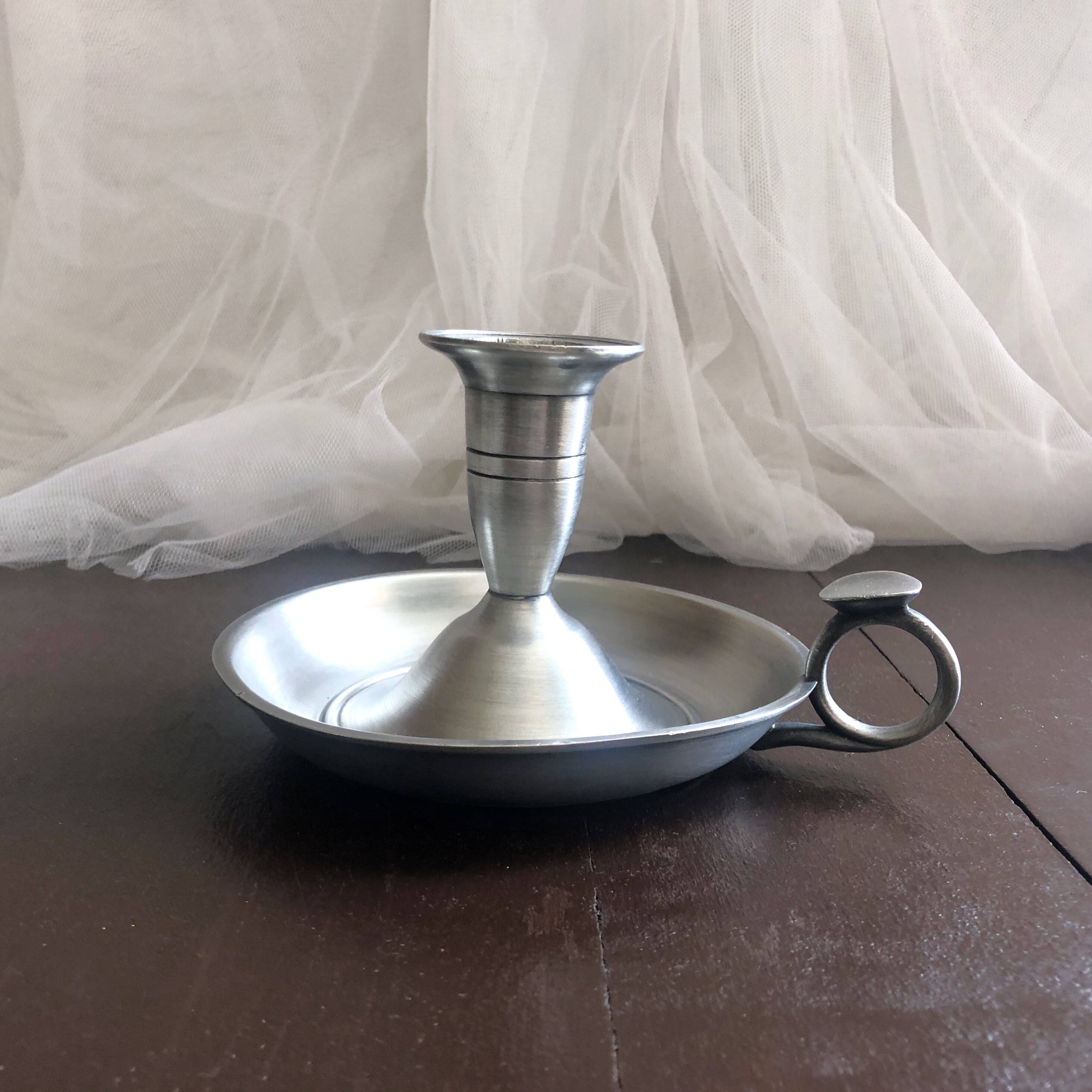 Pewter hand candle holder