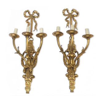 Pair of gilded bronze wall lamps