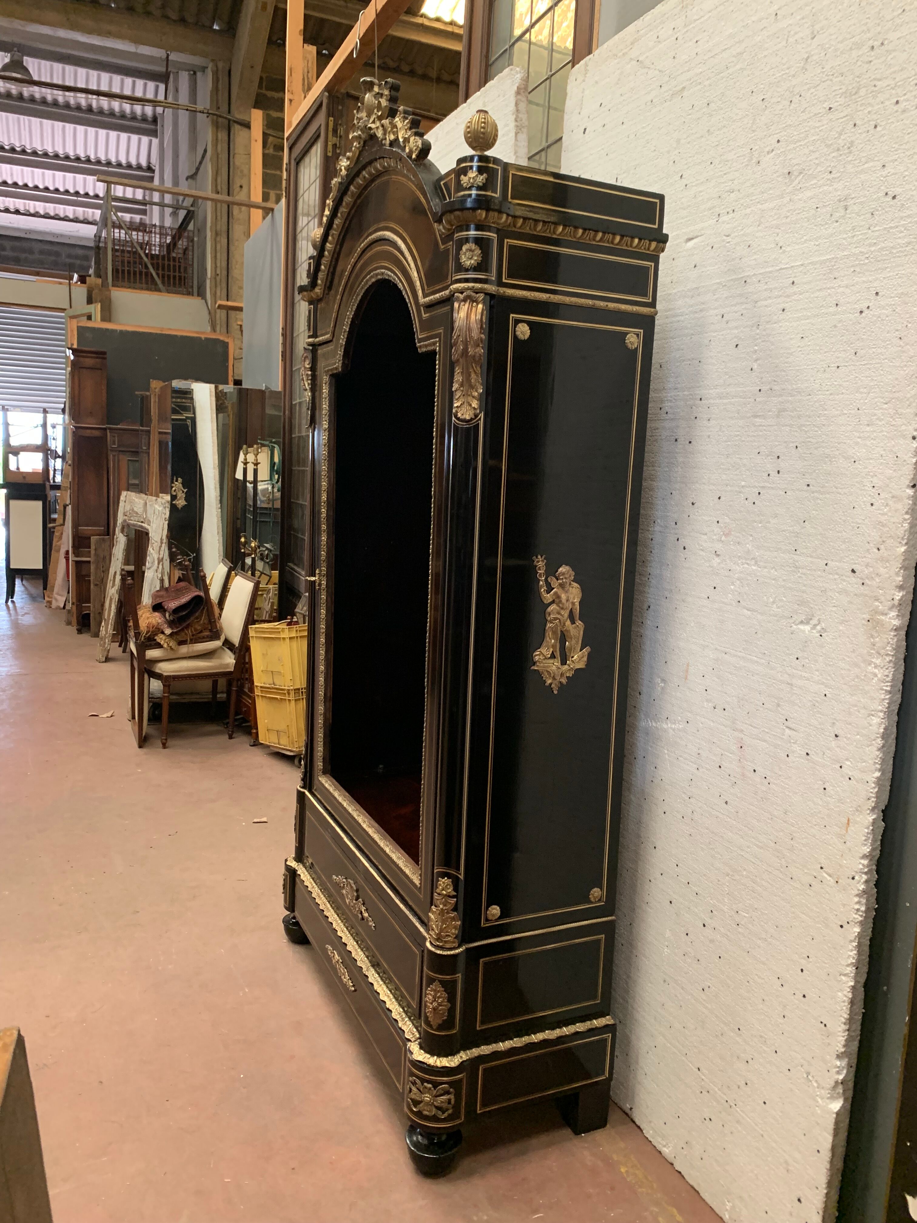 Napoleon III ceremonial showcase in black wood and gilded chiseled bronze XIX century