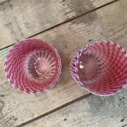 Two Northwood glasses from the 1930s in opalescent pink glass.