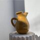 Large vintage artisanal glazed earthenware pitcher with pinched spout