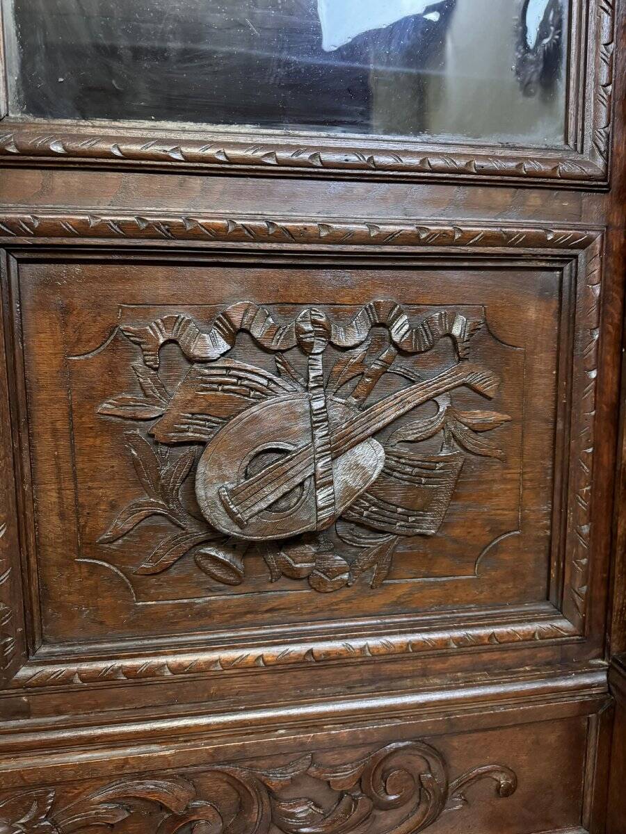 Renaissance style hunting lodge library in carved oak circa