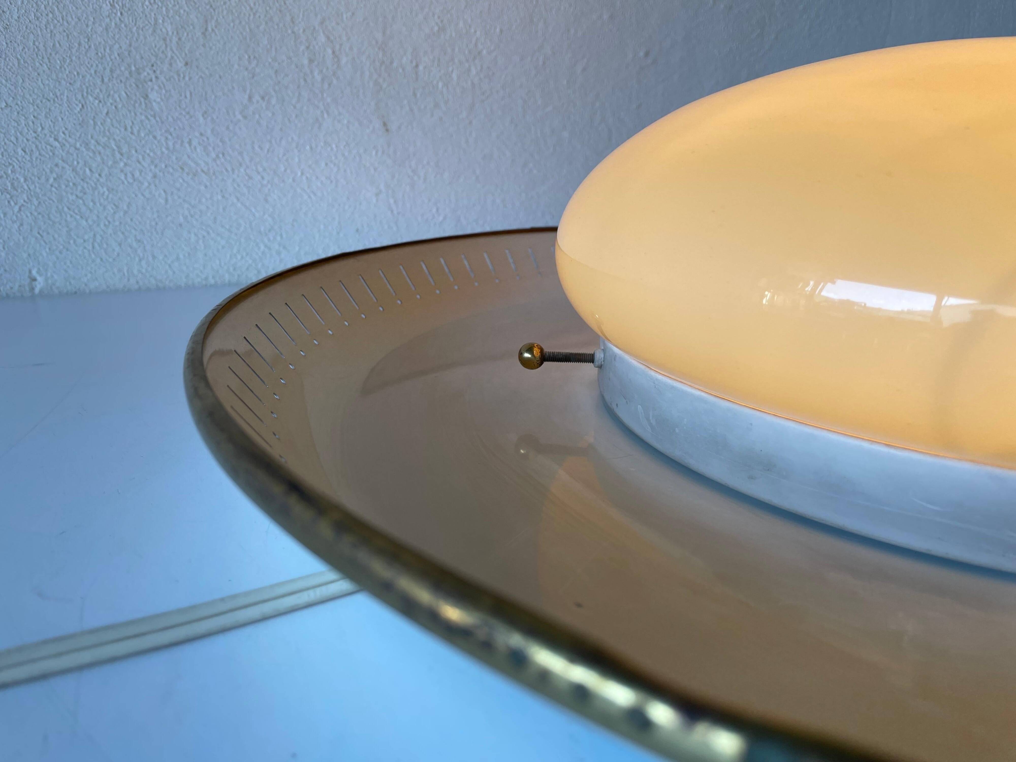 Brass disc and glass clip lamp from the mid-century by Hillebrand, 1950s, Germany.