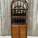 Library shelf, vintage rattan storage unit and canning.