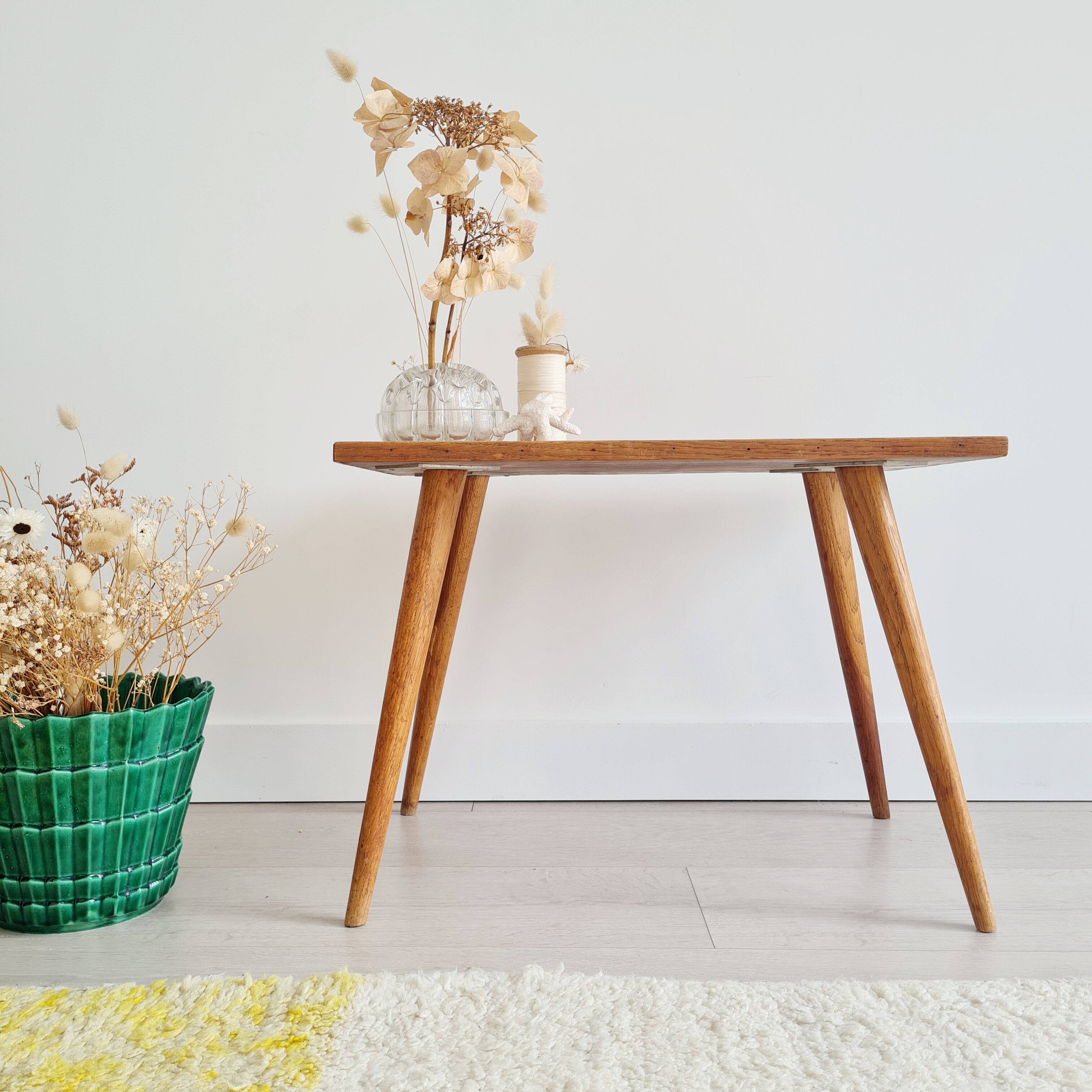 Antique coffee table with compass legs