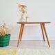 Antique coffee table with compass legs