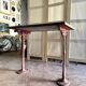 Grey marble and burgundy cast iron bistro table ☐ 85 x 57 cm